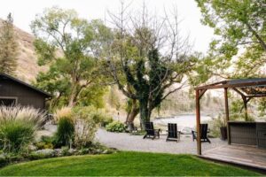 Lounge by the river at Mackay Bar Ranch